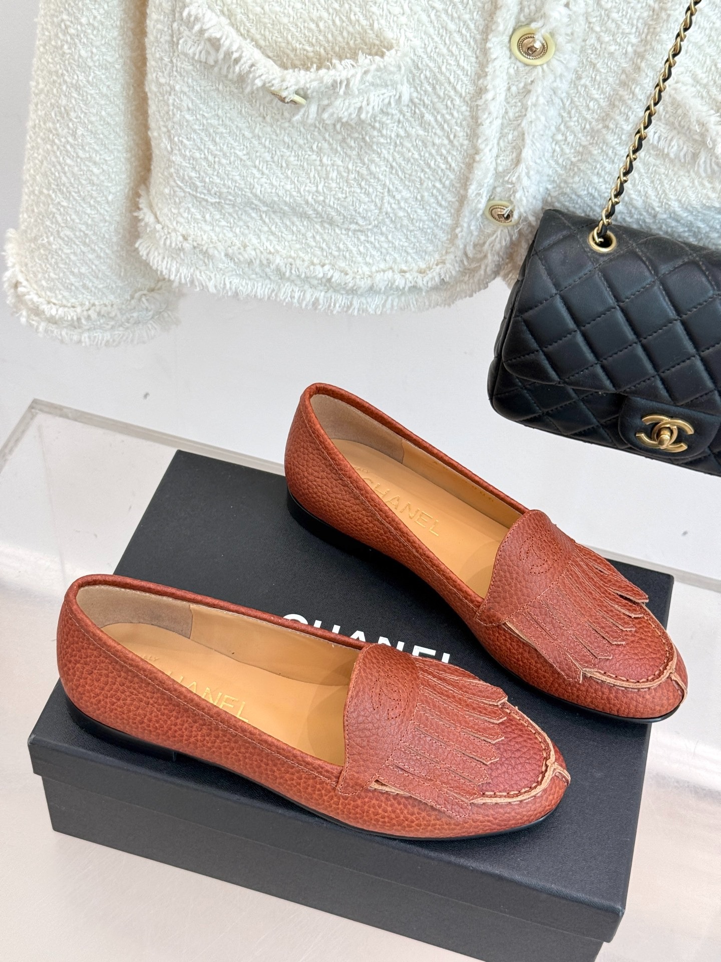 샤* 클래식 더블 C 태슬로퍼